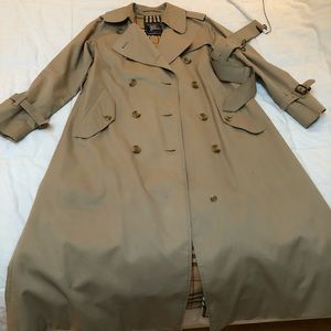 Full length Woman’s Burberry raincoat